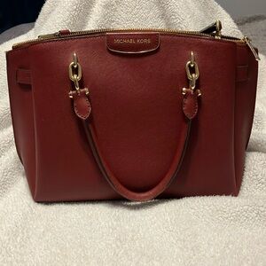 Michael Kors purse and Kim Rodger’s wallet